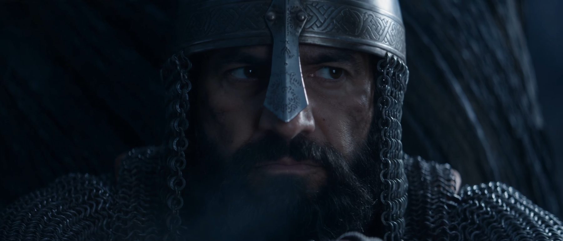 An armored warrior in chainmail, close on the face