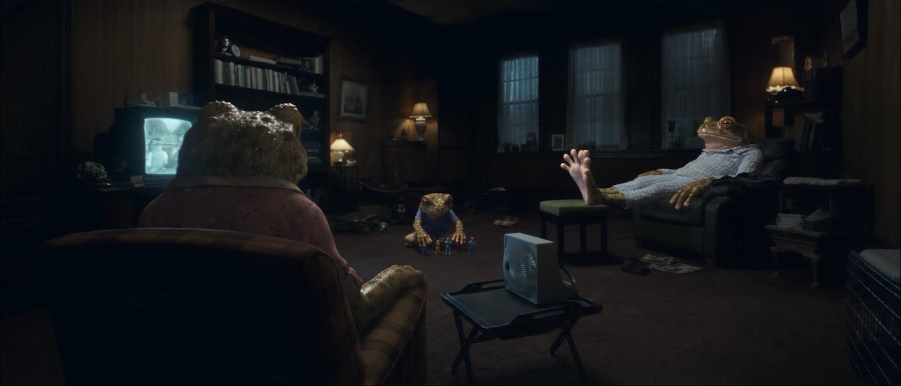 Full Time — the frog family watching TV in a dim living room