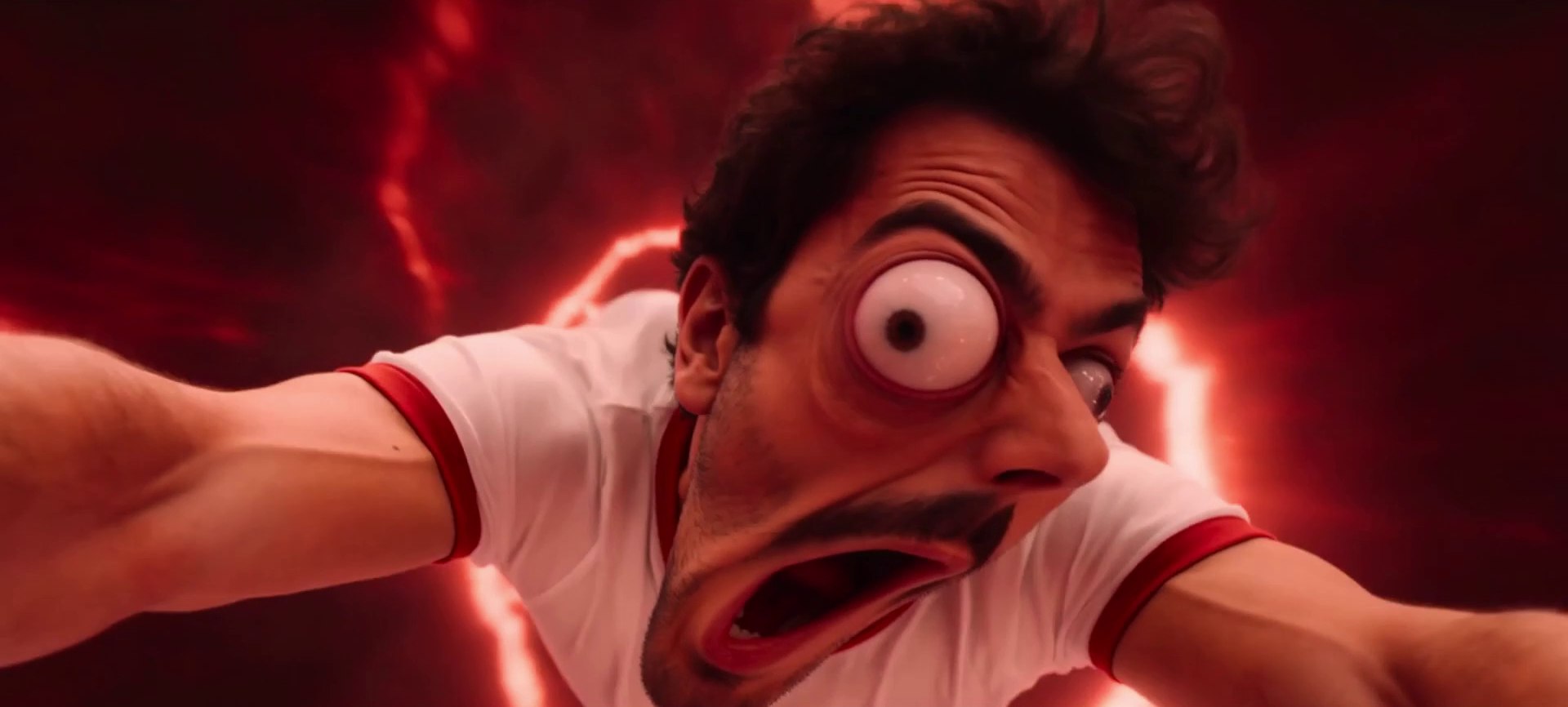 Extreme close-up of the man's face mid-transformation, one eye bulging cartoonishly, mouth open, red light behind